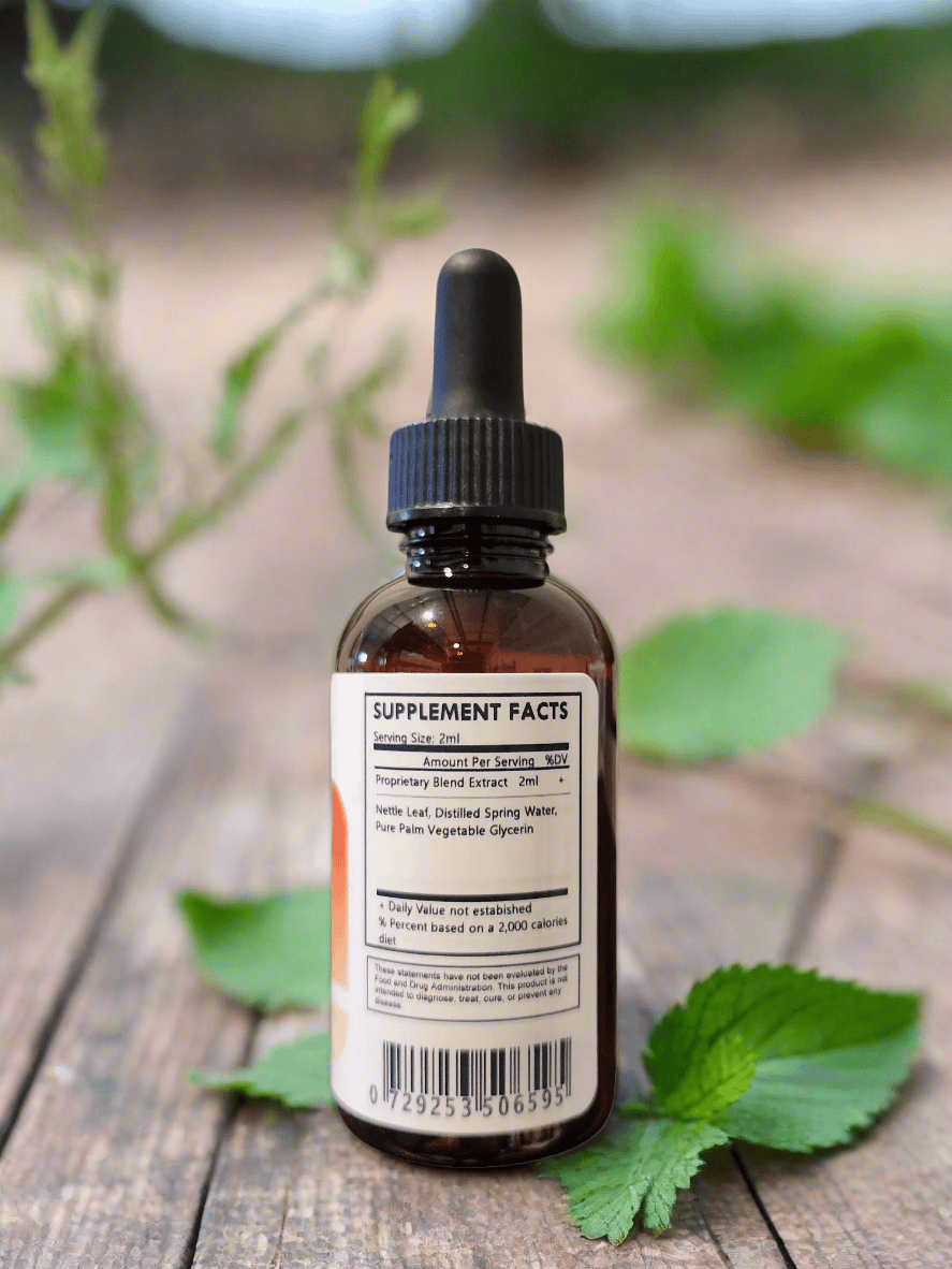 Herbal Island nettle leaf tincture in a glass dropper bottle, liquid extract of Urtica Dioica for herbal health use.