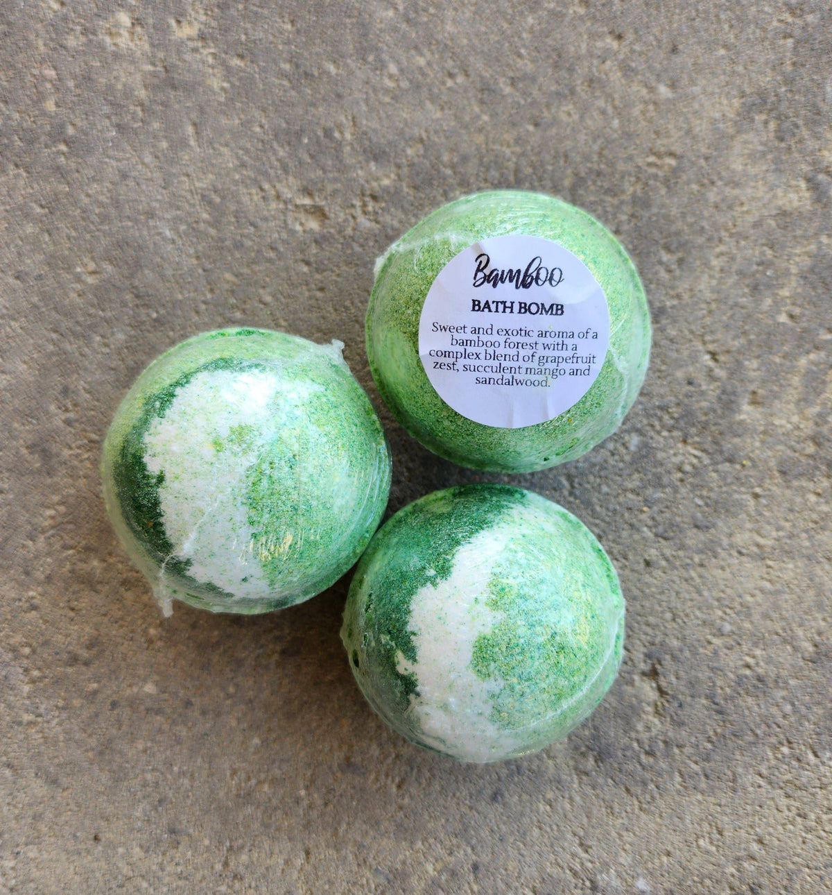 Herbal Island bamboo bath bombs in a 3-pack, natural round bath bombs with bamboo accents for relaxing bath experience.