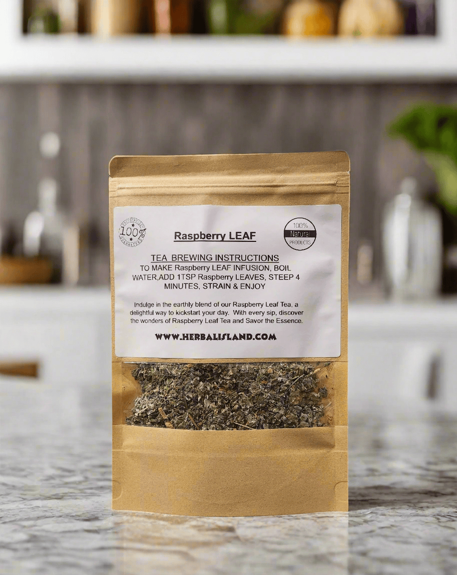 Dried raspberry leaf tea in a clear container, showing the green, shredded cut and sift herbal tea leaves from Herbal Island.