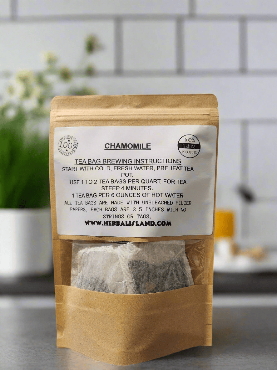 Herbal Island chamomile tea bags in a white box, showing individually wrapped tea bags with chamomile flowers on the packaging.