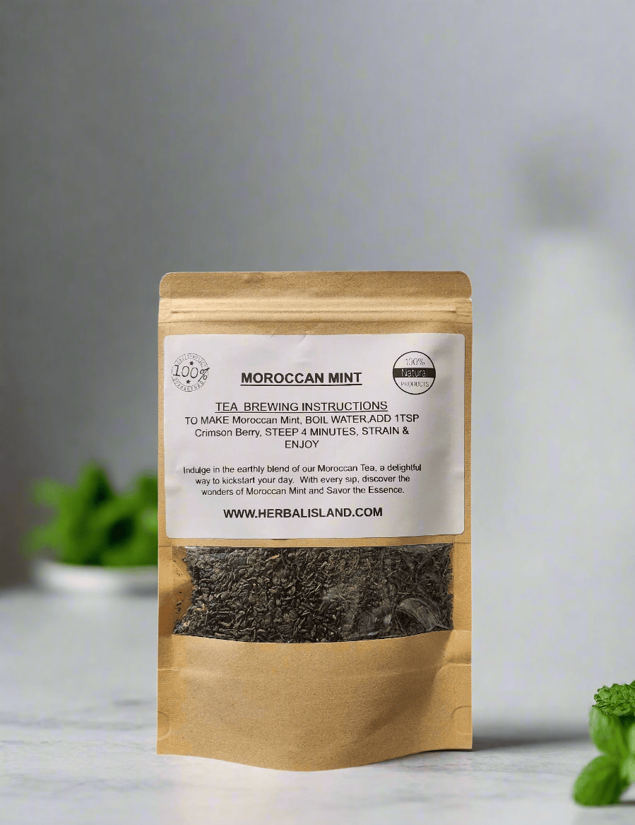 Loose Moroccan Mint Tea by Herbal Island, cut and sifted, with fresh mint leaves and tea leaves in a clear glass jar.