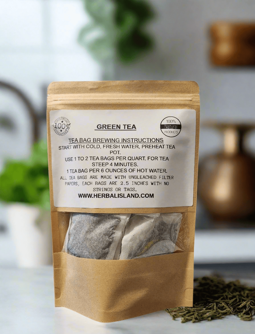 Herbal Island green tea bags stacked in a clear container, showcasing vibrant green tea leaves inside.