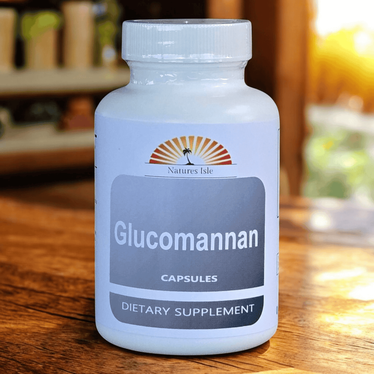 Herbal Island glucomannan konjac capsules made from konjac root, shown in a clear container with capsules visible.