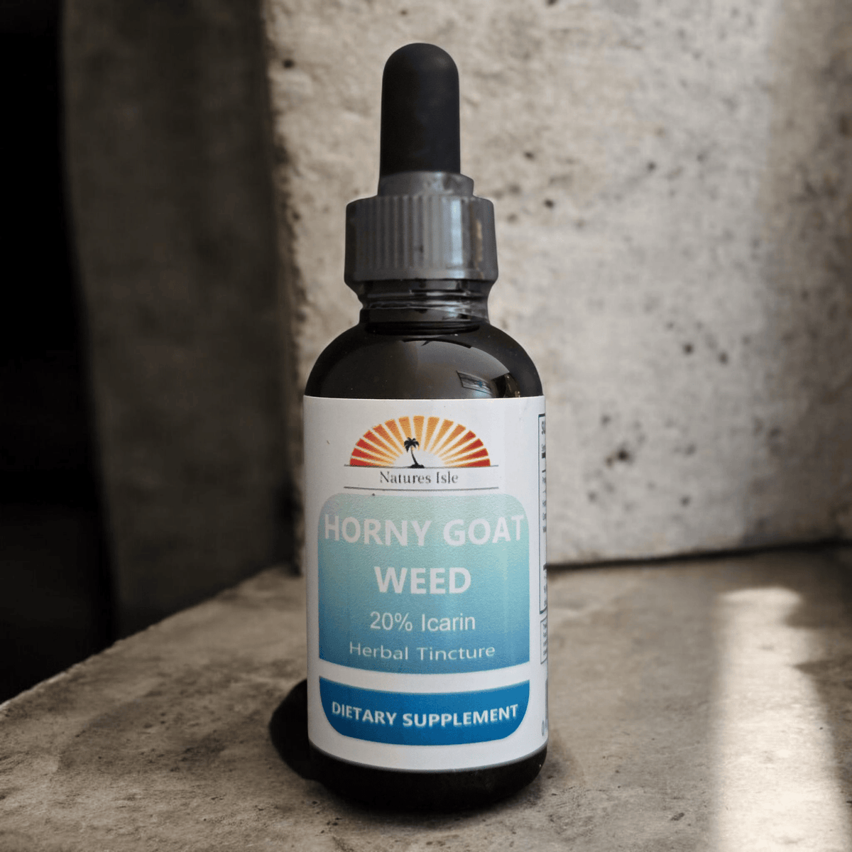 Herbal Island Horny Goat Weed Liquid Extract bottle with label, alcohol-free formula containing 20% Icarin, on a plain background.