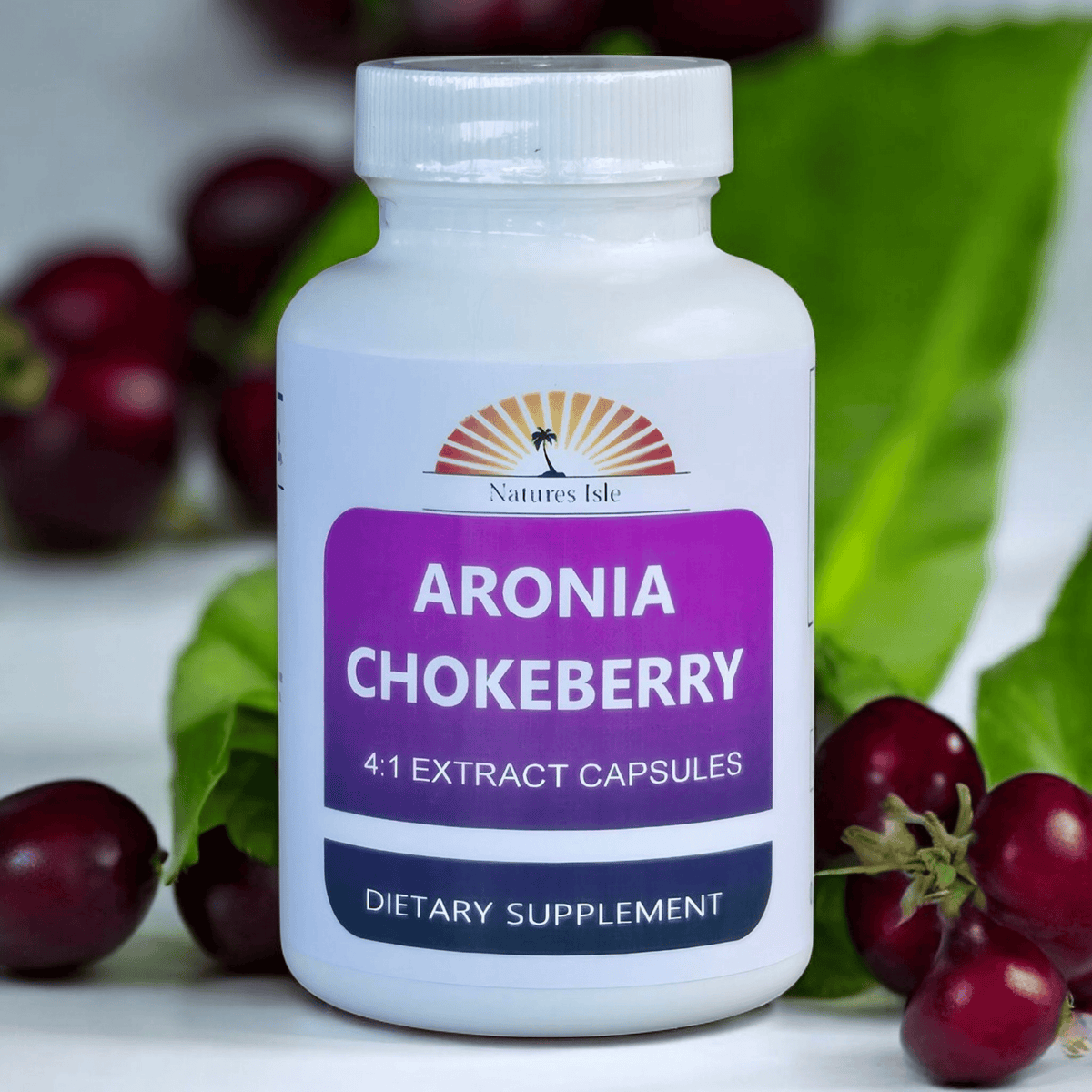 Herbal Island Aronia Extract 4:1 capsules in a white bottle, showing the supplement capsules and label.